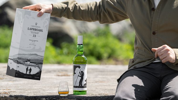 Laphroaig33YearOldStrongCharacter_Bottle&BoxInHand.jpg