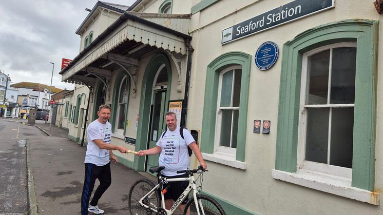 Station relay race swap over point at Seaford