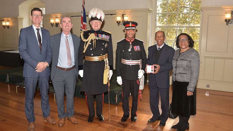 Siggy Cragwell (pictured second right with his niece, Myrtle) receives his BEM at the Tower of London.jpg