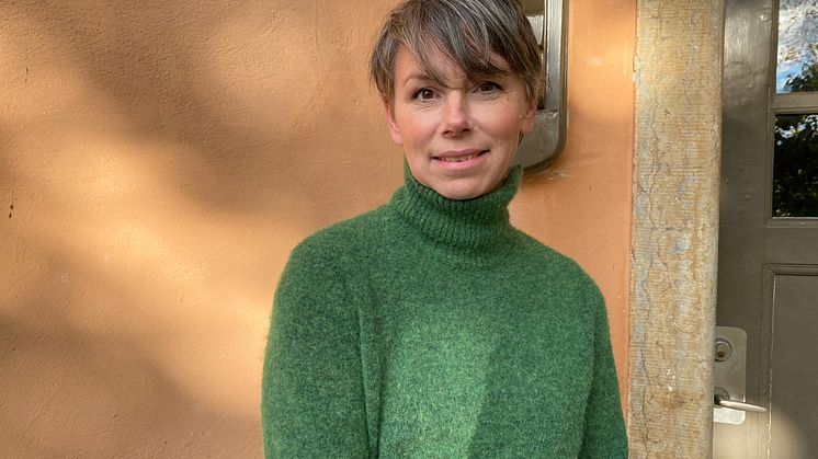 Hon tar plats som rådgivare i OIML