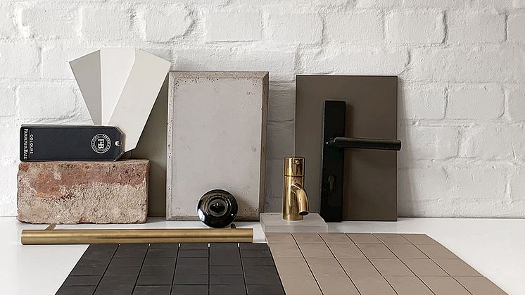 Materialcollage der Architekten mit Kupfer, Ziegel, Beton und der Schalterserie Berker Serie 1930