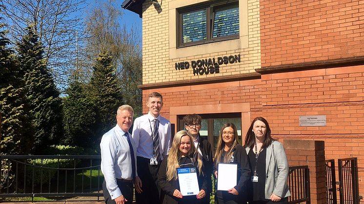 ng homes staff; Tony Sweeney, Depute Director (Corporate Services), Alan Nicolson, CSO, Lucy Brown, CSO, Connor Hazlett, CSO/Housing Assistant, Danielle Quinn, Housing Officer, Karen Johnson, Housing Manager proudly display the IIYP Gold Certificate
