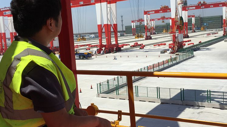 Under control: an operator controls STS cranes from a safe distance at the Port of Yanhshan, China. 