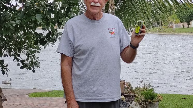 Hi-res image - ACR Electronics - Frank Boyar with his ACR Electronics ResQLink Personal Locator Beacon