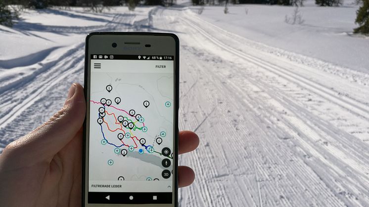 Lofsdalens app med skidspår i bakgrunden
