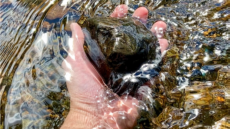 Stone in hand