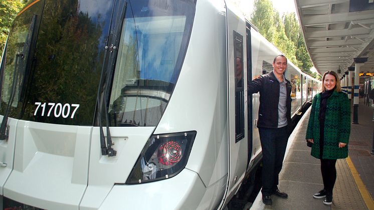 Driver Michael DeVries and passenger Samantha Radford at Gordon Hill on the first new Moorgate train in passenger service
