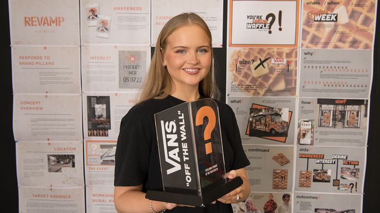 Graduate Olivia Mackinnon with her Student of the Year award