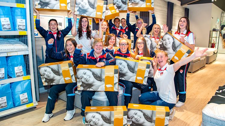 Saints Women's RFC celebrate raising £500 for St Helens homeless  in-store at JYSK