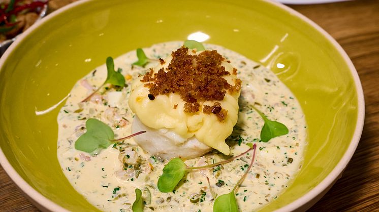 10 Skrei fish pie topped with creamed mustard mash, a herb crumb, and a prawn tartare sauce.jpg