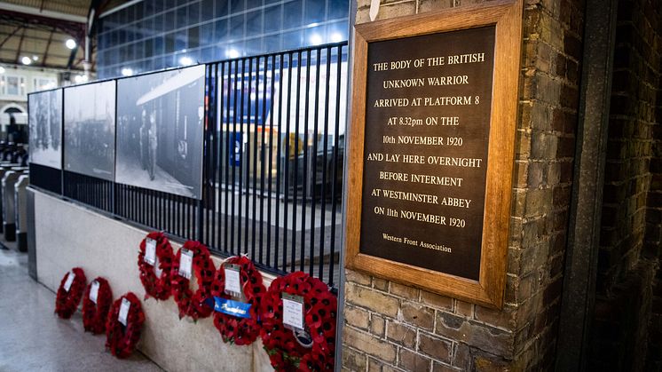Commemorative poppy wreaths adorn platform 8 at Victoria station