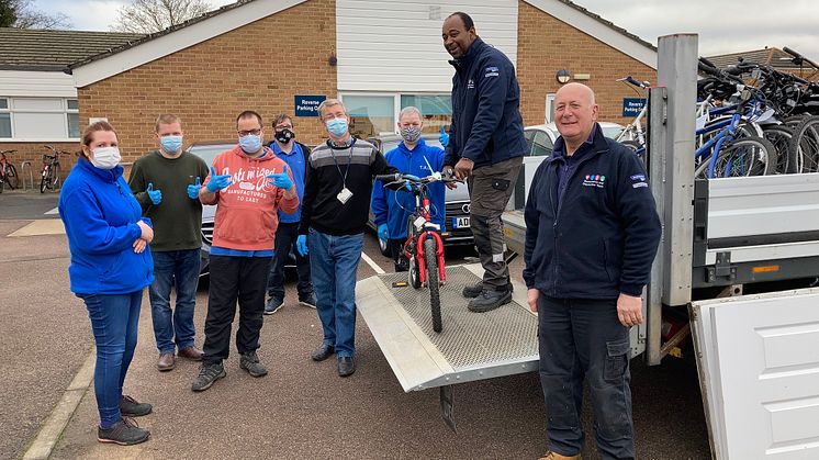 TAG Bikes trainee mechanics and their trainer take delivery of abandoned bikes from GTR’s Courtney Franklin and Paul Harknett