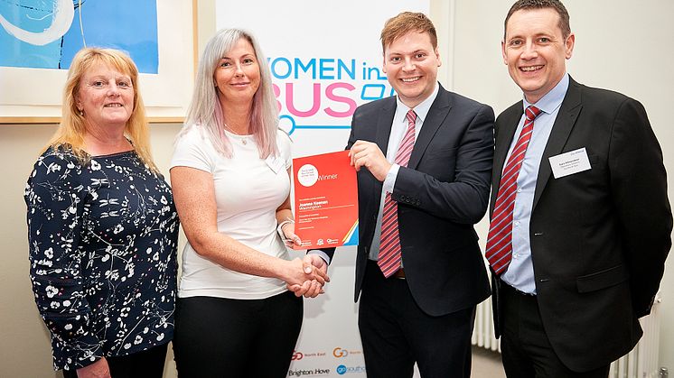Joanne Keenan presented with her Team GNE Bus Driver of the Year certificate