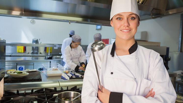 3931560-smiling-chef-holding-ladle