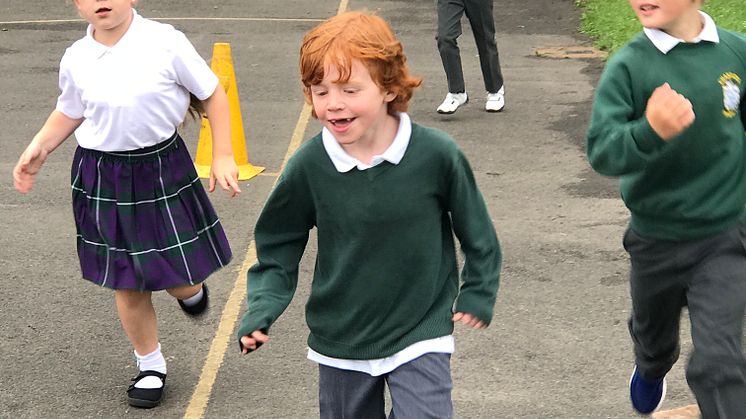 Children do the Daily Mile at Chantlers Primary School in Bury