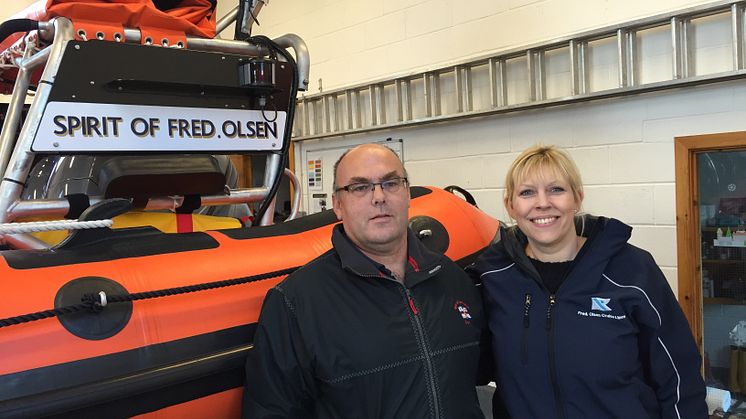 Fred. Olsen Cruise Lines' Rachael Jackson and Sandy Murray of Kyle of Lochalsh RNLI celebrate the two organisations' long-standing partnership, with Atlantic 85-class lifeboat 'Spirit of Fred. Olsen'   