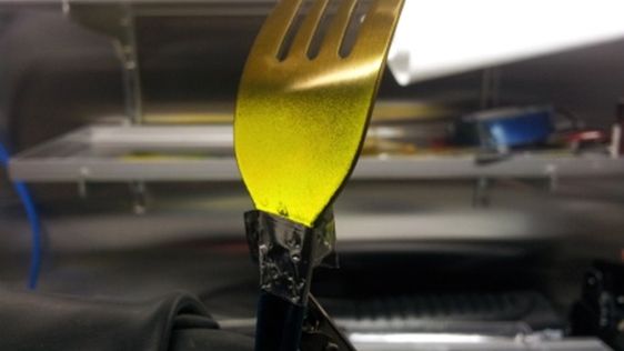 Light-emitting fork made with sprayed LEC technology