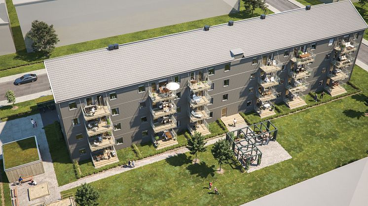 Översiktsillustration över BoKlok Landeriet, med gemensam uteplats, grönytor och lekplats. 
