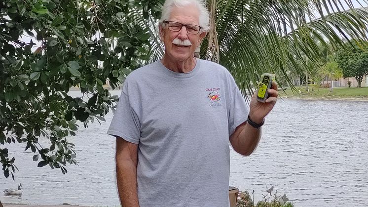 Frank Boyar with his ACR Electronics ResQLink Personal Locator Beacon