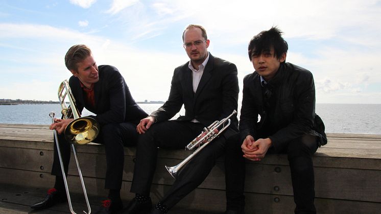 Trio Huang-Draglund-Rudolfsson