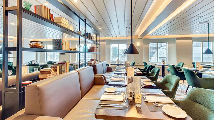The new dining area in MS Kong Harald, with comfortable seating and charming decor