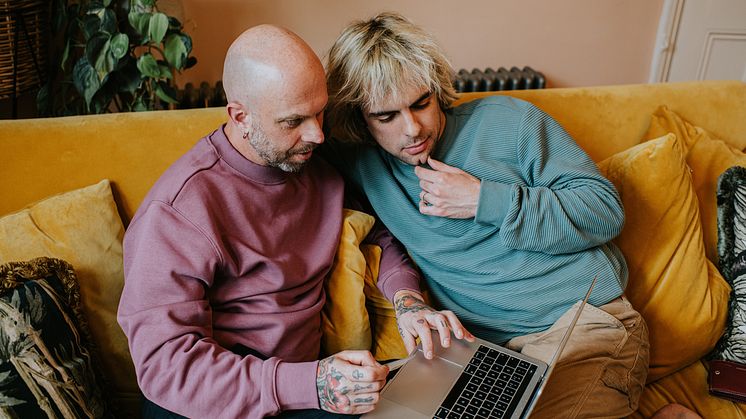 THEME_LGBTQ_GAY_COUPLE_LAPTOP_UK_GettyImages-1391657397_Universal_Within usage period_97929