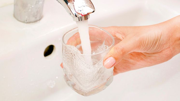 A refreshing glass of water, but will climate change jeopardize access?  (Photo Credit: Gorvik  Stock photo ID:470158104)
