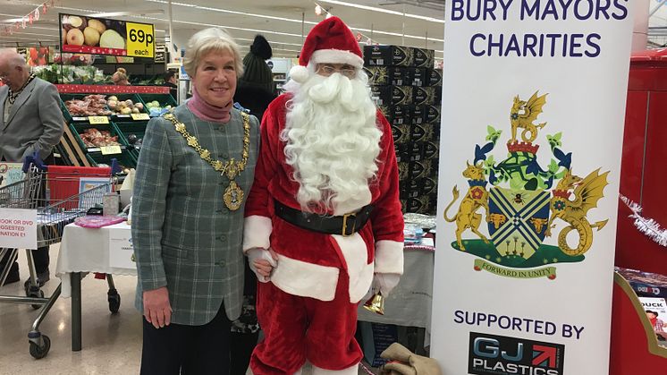 The Mayor, Cllr Dorothy Gunther, with Santa at the Bury Tesco fundraiser