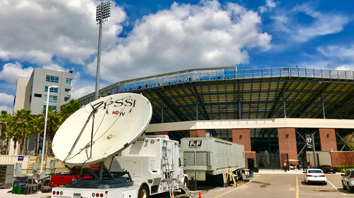 Leveraging satellite services to broadcast large scale sporting events