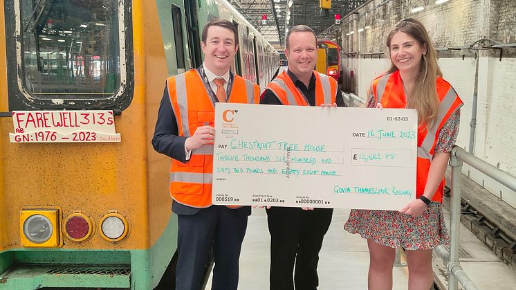 GTR's Chris Fowler and Antony Yandell hand a £12,662 cheque to Ella Pilkington of Chestnut Tree House children's hospice