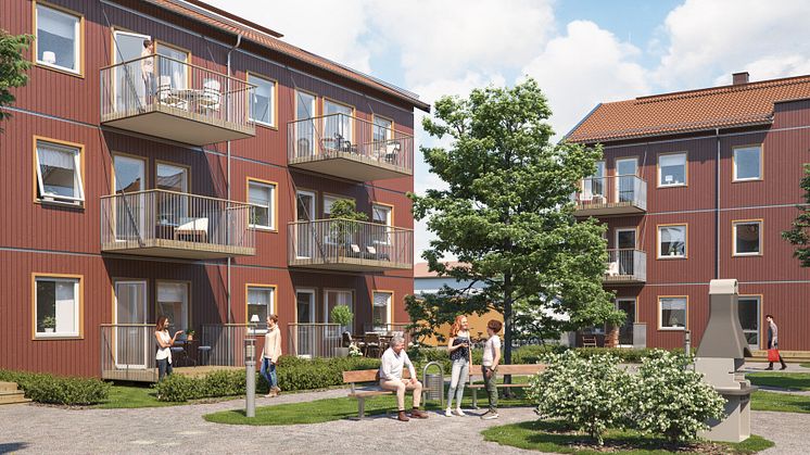 Illustration av gårdssida med balkonger/altaner och gröna ytor, BoKlok Skölden i södra Hemlingby, Gävle