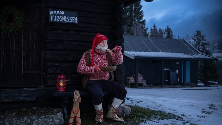 Fjøsnisse - a Nisse eating Christmas porridge. Photo: Bastian Fjeld/VisitNorway