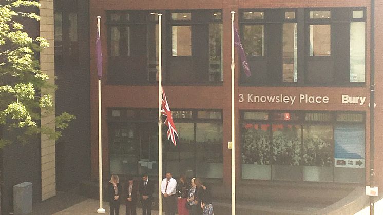 Cllr Shori and senior council colleagues show their respect this morning as the Union flag flies at half-mast