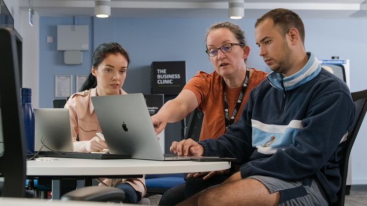 Students collaborating in the Business Clinic