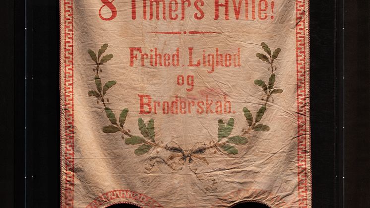 Banner with the text ”8 Hours’ Work! 8 Hours’ Freedom! 8 Hours’ Rest!”, around 1914