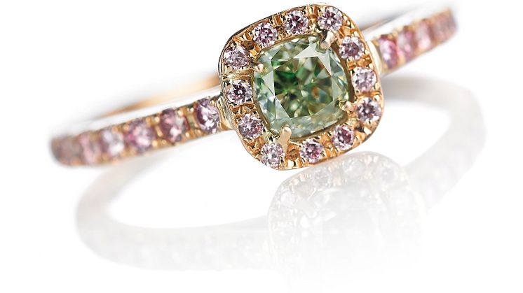 Green and pink diamond ring set with a natural fancy intense green diamond and  natural pink Argyle diamonds.