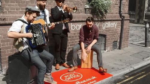 Street Performers in Edinburgh Celebrate Sundays with the Post Office