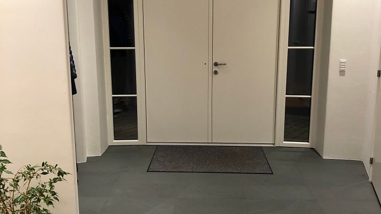 Pål Ross-ritad villa med takskifferfasad från Nordskiffer