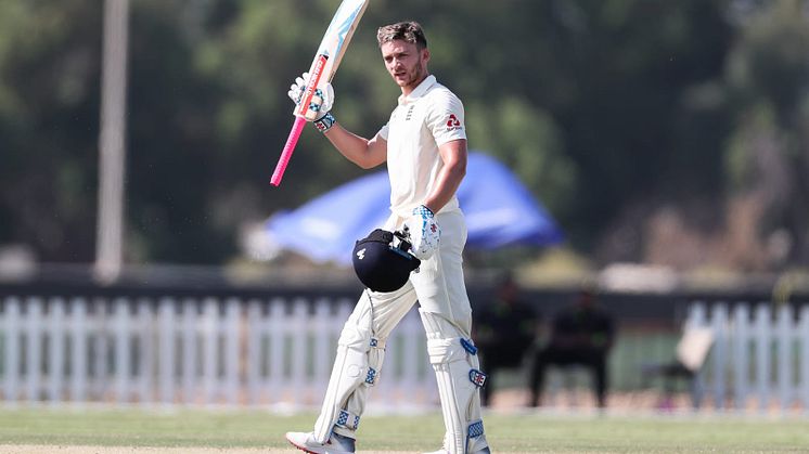 Joe Clarke celebrates his hundred. Photo: Sporta Group