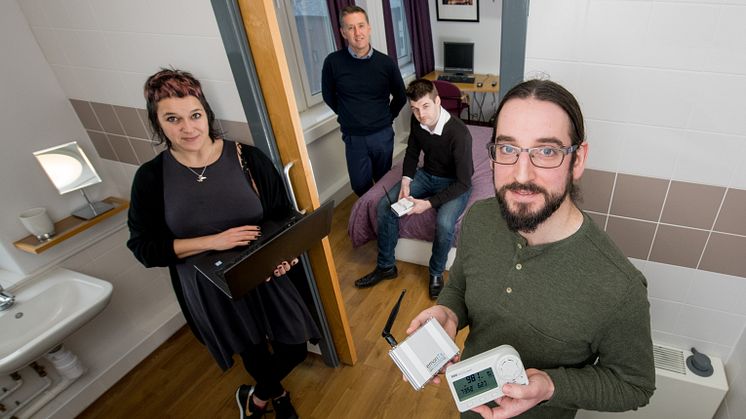 From l-r: Dr Kay Rogage (Northumbria University), Mark Riley (Your Homes Newcastle), Graham Coulby (BIM Academy) and Dr Adrian Clear (Northumbria University), pictured with the smart sensors used in the project.