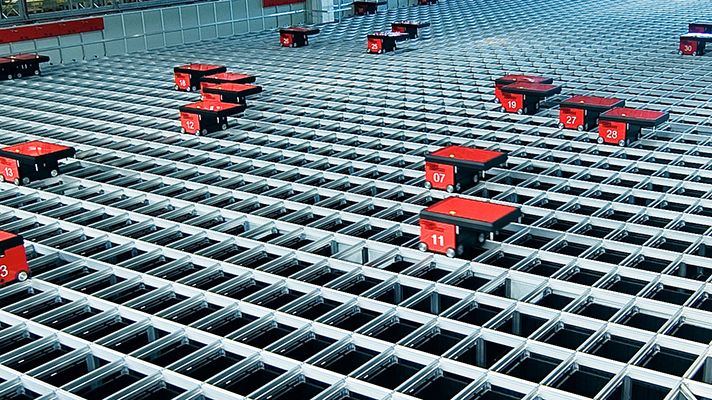 Blåkläder utvider – investerer i helautomatisk logistikkløsning.