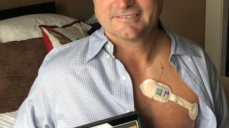 Mike Wilson, 59, being monitored at home by the Patient Status Engine and Isansys Lifetouch wearable sensor