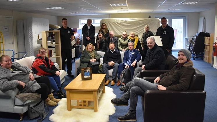 Steve Buckley from Manorview with ng homes volunteers and staff, Board member Richard porter, Rossie Stone from Dekko Comics and elected members Bailie Jaqueline McLaren, Councillor Allan Gow and Bob Doris MSP at the Redistribution Unit in Springburn