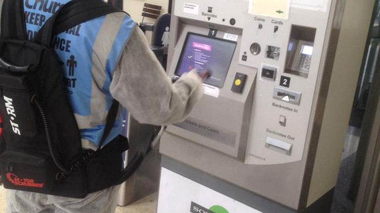 Worthing station, inside: Applying the 30-day viruscide