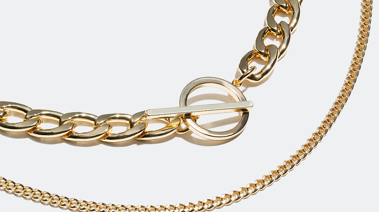 Layers of chain necklaces.