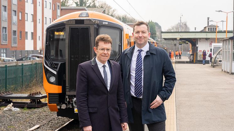 Mayor of the West Midlands Andy Street and West Midlands Railway managing director Ian McConnell with a Class 730 train at Four Oaks