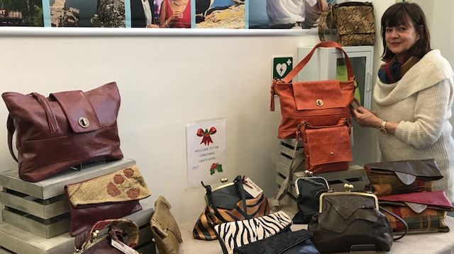 Sue Flack, Senior Administration Assistant, Fred. Olsen Cruise Lines with her handbags