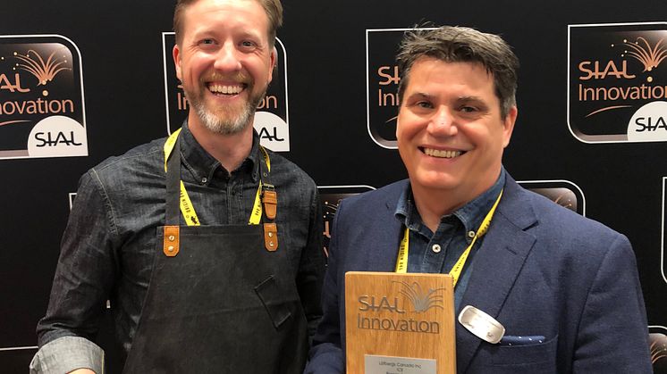 Anders Dahlqvist and Jon Leirfall Fornes accepted the award on behalf of Löfbergs Canada.