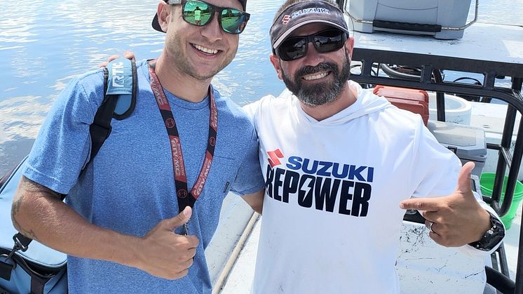 Mathew Cobb, grand prize winner of Mastry Engine Centers Owner's Edge Strike It Big Contest, with Captain Travis Yaeckel, of the Instinct Fishing Company