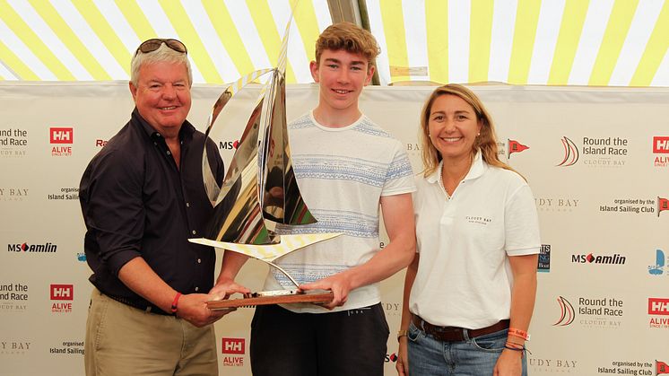 From left: Sir Keith Mills, Chairman of the Royal Foundation and Founding Director of Land Rover Ben Ainslie Racing, Harvey Attrill, winner of the Raymarine Young Sailor Trophy and Cloudy Bay’s Senior Brand Manager, Maria Ines Pina.